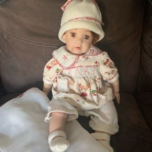 Porcelain baby doll and blanket